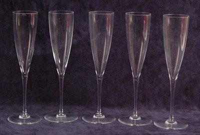 Lot 75 - A set of five Baccarat crystal glass champagne...