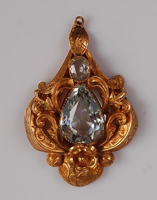 Lot 2145 - A yellow metal aquamarine pendant featuring a...
