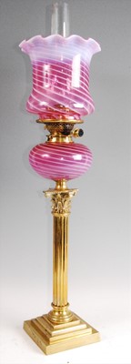 Lot 108 - A Victorian lacquered brass pedestal oil lamp,...