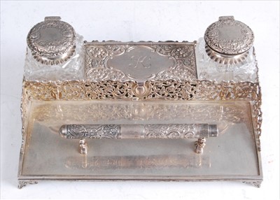 Lot 1146 - A late Victorian silver inkstand, having a...
