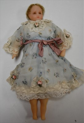 Lot 2236 - A English Victorian poured wax head doll,...
