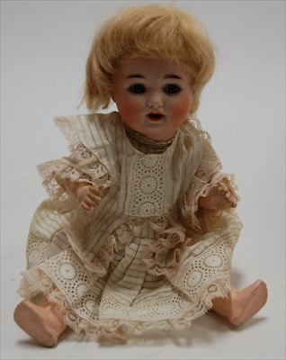 Lot 2252 - A Schutzmeister & Quendt bisque head doll,...