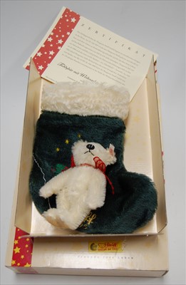 Lot 2265 - A Steiff teddy bear with Christmas Stocking...