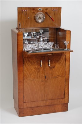 Lot 341 - An Art Deco figured walnut cocktail cabinet,...