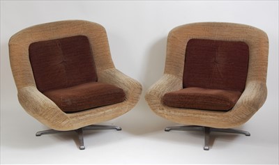 Lot 393 - A pair of 1960s fabric upholstered swivel...
