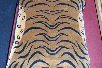 Lot 331 - A contemporary Liberty & Co Tibetan Tiger rug,...