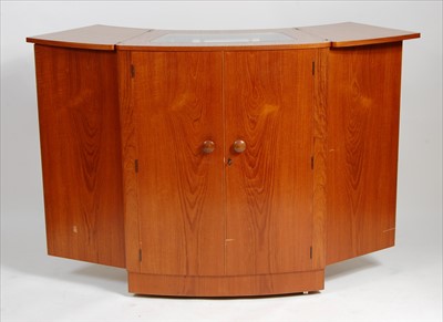 Lot 376 - A 1970s teak portable cocktail cabinet by...