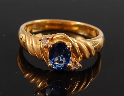 Lot 2158 - An 18ct yellow gold, sapphire and diamond...