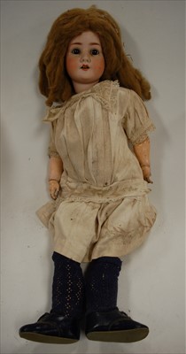 Lot 2295 - A Schoenau & Hoffmeister bisque head doll,...