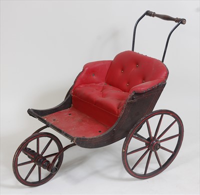 Lot 2299 - A Victorian childs invalid chair, having...