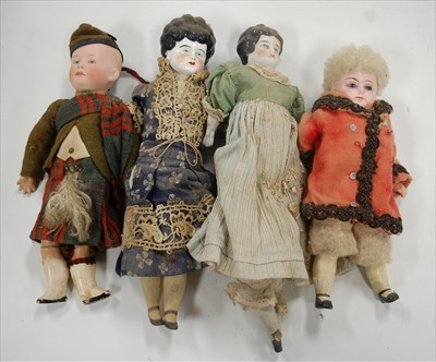 Lot 2309 - An Ernst Heubach bisque head doll in Scottish...