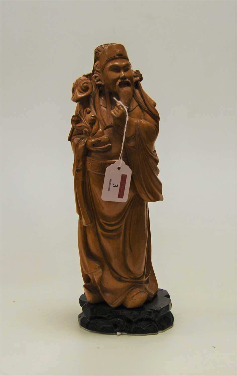 Lot 3 - A modern carved softwood figure of a sage, in...