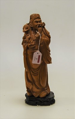 Lot 3 - A modern carved softwood figure of a sage, in...
