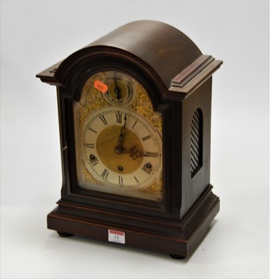 Lot 11 - A mahogany cased bracket clock, the silvered...