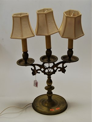 Lot 19 - A turned brass three-sconce candelabra (later...