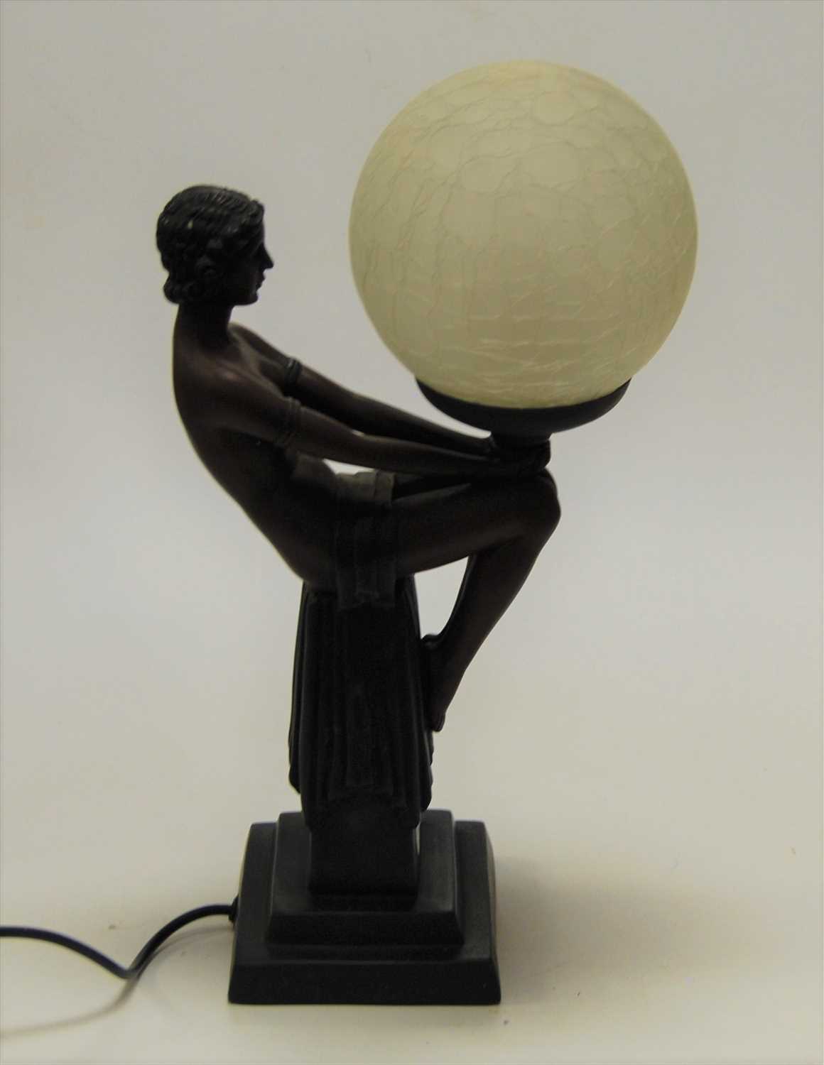 Lot 21 - A reproduction Art Deco style table lamp in...