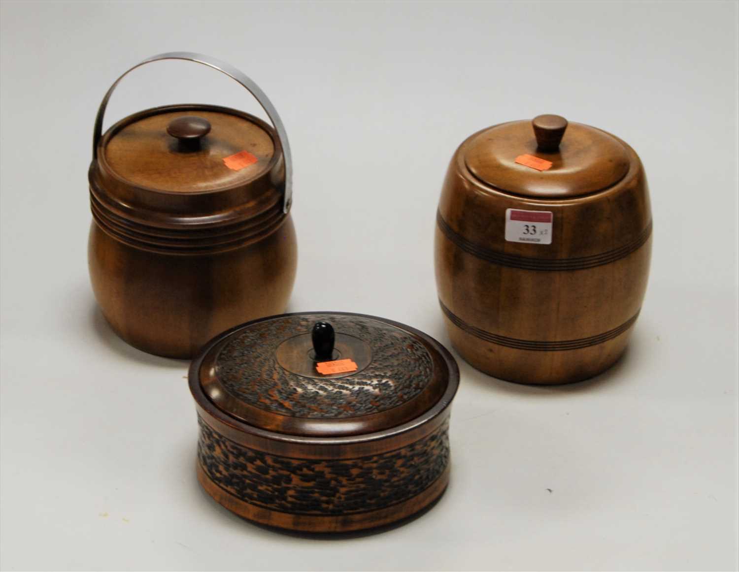 Lot 33 - A treen jar and cover of cylindrical form,...