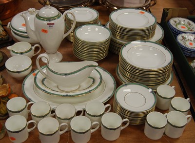 Lot 104 - A Wedgwood 12-place setting coffee/dinner...
