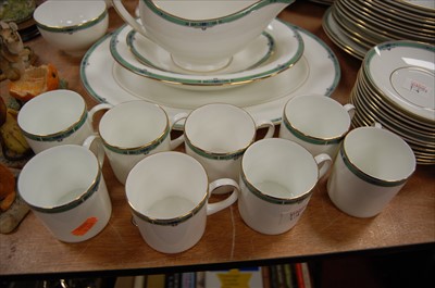 Lot 104 - A Wedgwood 12-place setting coffee/dinner...