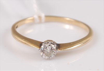 Lot 305 - An 18ct gold diamond solitaire ring, the old...