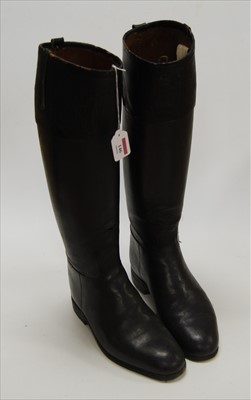 Lot 146 - A pair of black leather calf length riding boots