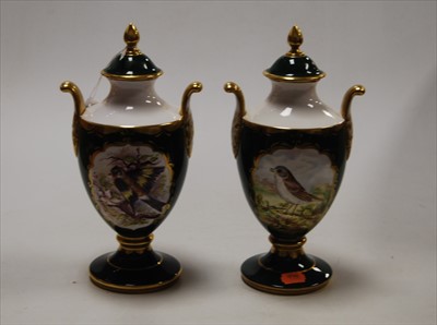 Lot 165 - A pair of Caverswall twin handled vases and...