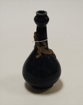 Lot 173 - A late 19th century blue glazed bottle vase,...