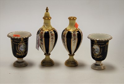 Lot 190 - A pair of Royal Crown Derby urn shaped vases,...