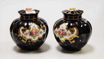 Lot 191 - A pair of Royal Crown Derby pot pourri jars...