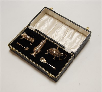 Lot 260 - An Elizabeth II silver three-piece cruet to...
