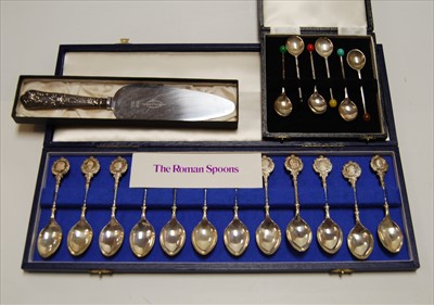 Lot 271 - A set of 12 silver commemorative teaspoons,...