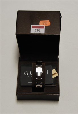 Lot 291 - A lady's Gucci steel cased bracelet watch,...