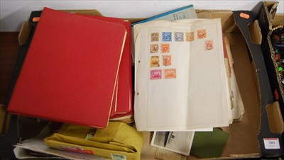 Lot 380 - A collection of loose stamps and stamp albums