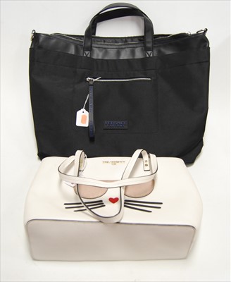 Lot 394 - A black lady's handbag, bearing Versace label,...