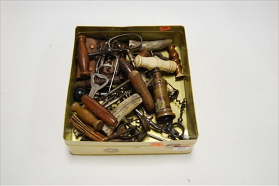 Lot 403 - A collection of corkscrews and bottle-openers,...