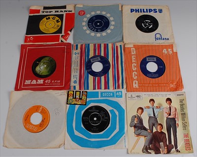 Lot 561 - A collection of 7" singles to include