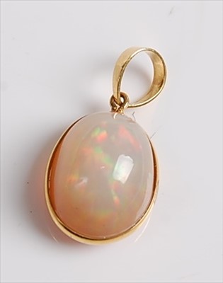 Lot 2187 - A yellow metal opal pendant, the Ethiopian...