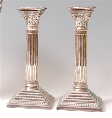 Lot 1149 - A pair of Victorian style silver candlesticks,...