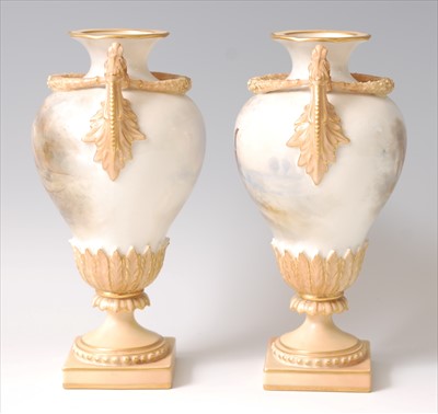 Lot 1074 - A pair of Royal Worcester porcelain pedestal...