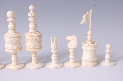 Lot 1294 - A 19th century English turned bone chess set,...