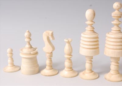 Lot 1295 - A 19th century English carved bone chess set,...