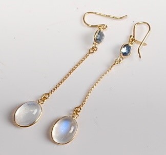 Lot 2162 - A pair of yellow metal, sapphire and moonstone...