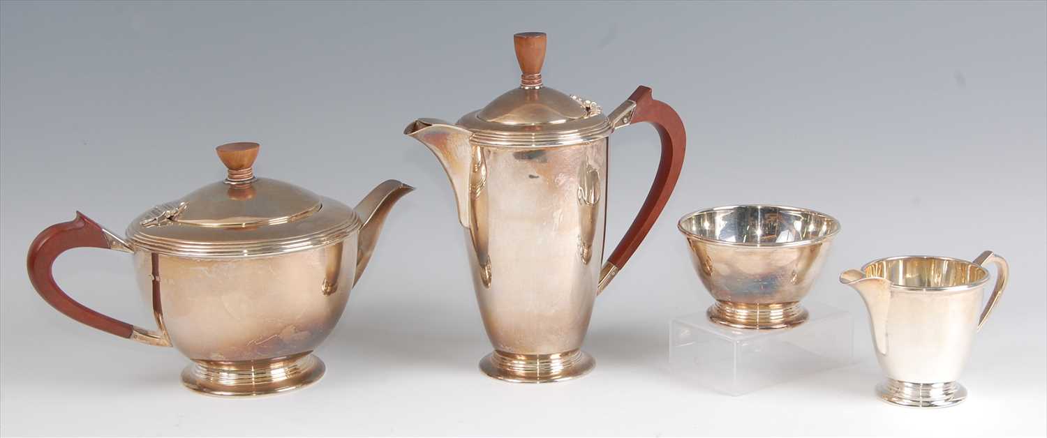 Lot 131 - An Art Deco style silver four-piece tea and...
