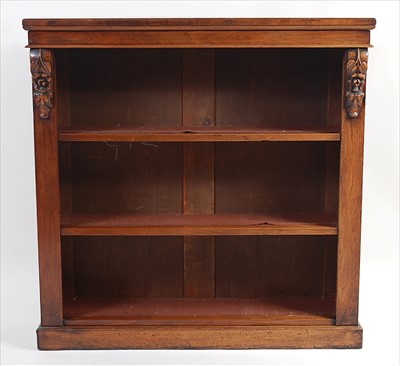 Lot 1485 - A Victorian figured walnut freestanding open...