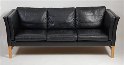 Lot 372 - A 1970s Danish black leather three-seater sofa...