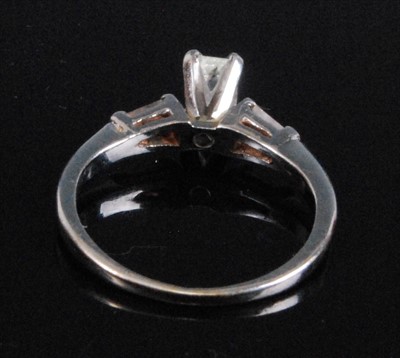 Lot 1194 - A white metal diamond single stone ring,...