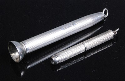 Lot 313 - A modern silver cigar punch, having engine...