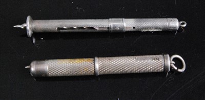Lot 328 - A modern silver propelling cigar piercer...