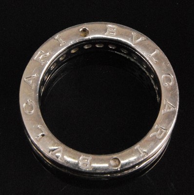 Lot 1214 - A silver full hoop eternity ring by Bulgari,...