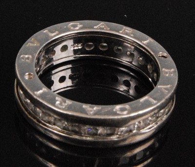 Lot 1214 - A silver full hoop eternity ring by Bulgari,...